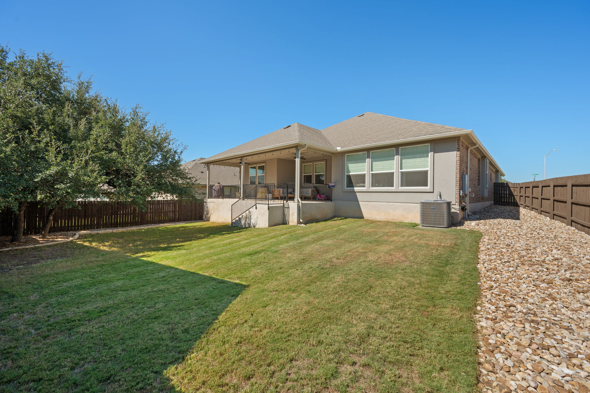 1808 Weavers Bend Georgetown, TX 78628 - Photo 25 of 30 a view of a house with a backyard