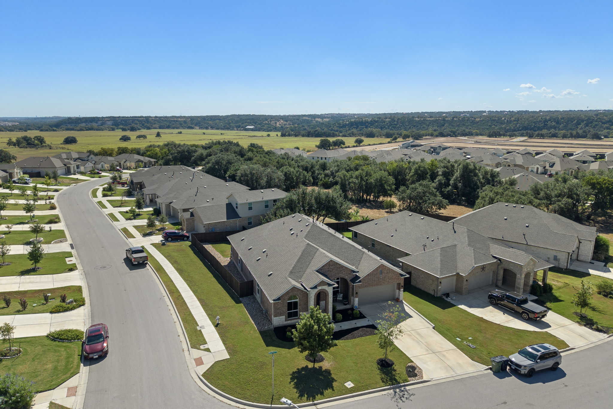 1808 Weavers Bend Georgetown, TX 78628 - Photo 28 of 30 an aerial view of residential houses with outdoor space