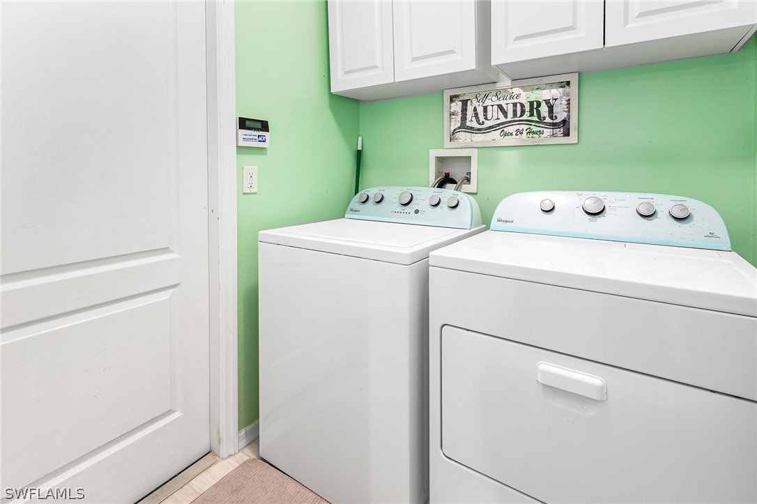 17557 Ingram Road Fort Myers, FL 33967 - Photo 11 of 29 a utility room with dryer and washer