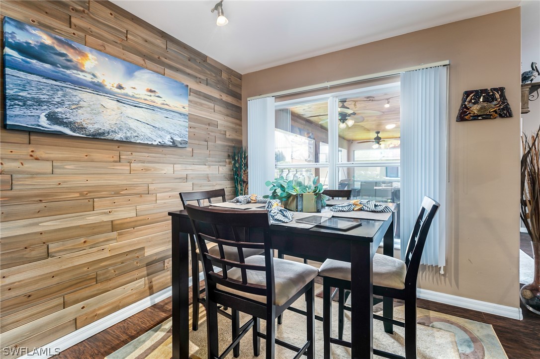 17557 Ingram Road Fort Myers, FL 33967 - Photo 12 of 29 a view of a dining room with furniture and window