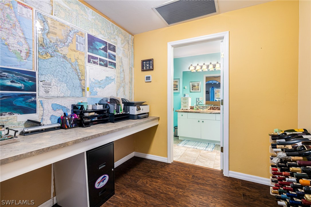 17557 Ingram Road Fort Myers, FL 33967 - Photo 18 of 29 a kitchen with a sink and cabinets