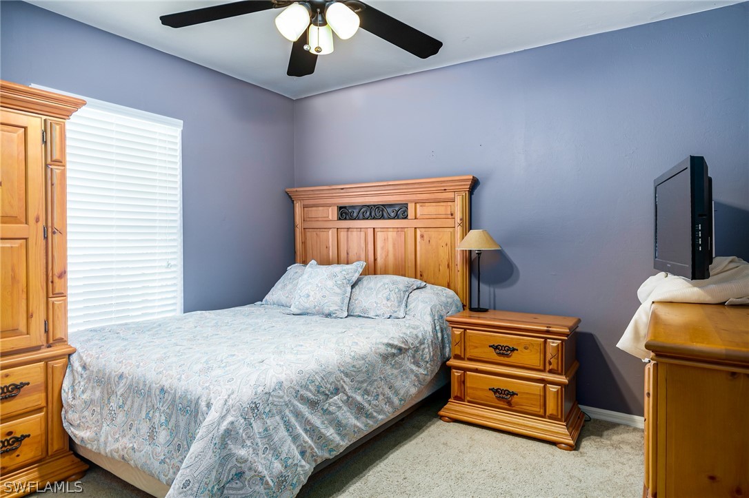 17557 Ingram Road Fort Myers, FL 33967 - Photo 21 of 29 a bedroom with bed and window
