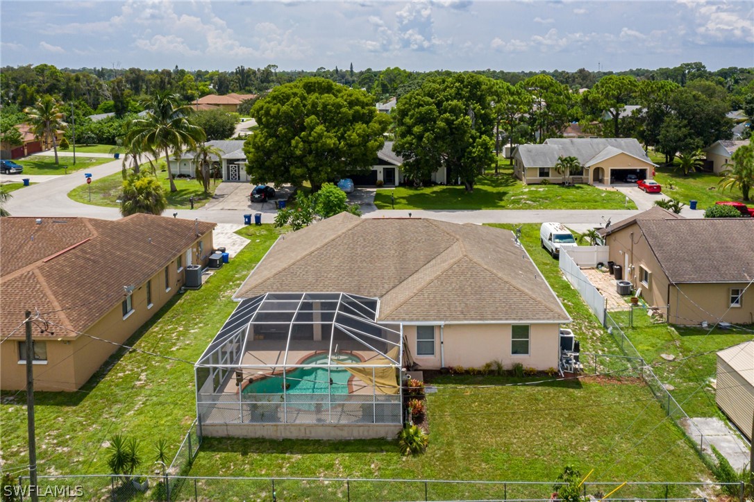 17557 Ingram Road Fort Myers, FL 33967 - Photo 28 of 29 a aerial view of a house with a yard and sitting area