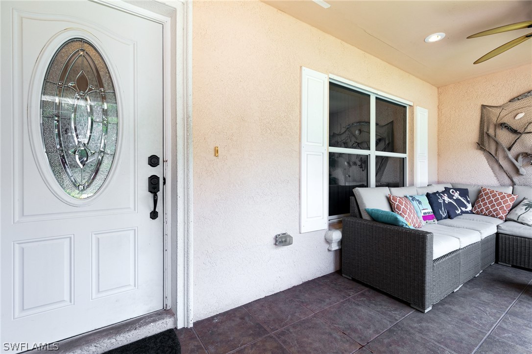 17557 Ingram Road Fort Myers, FL 33967 - Photo 3 of 29 a living room with furniture and a window