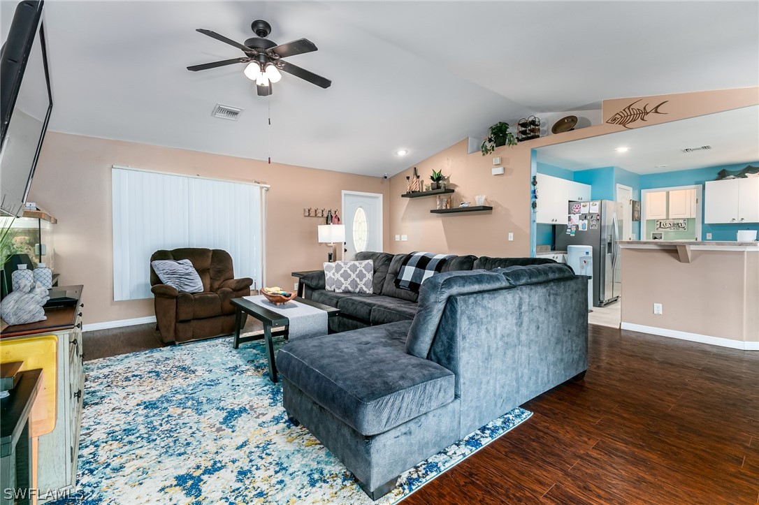 17557 Ingram Road Fort Myers, FL 33967 - Photo 6 of 29 a living room with furniture and wooden floor