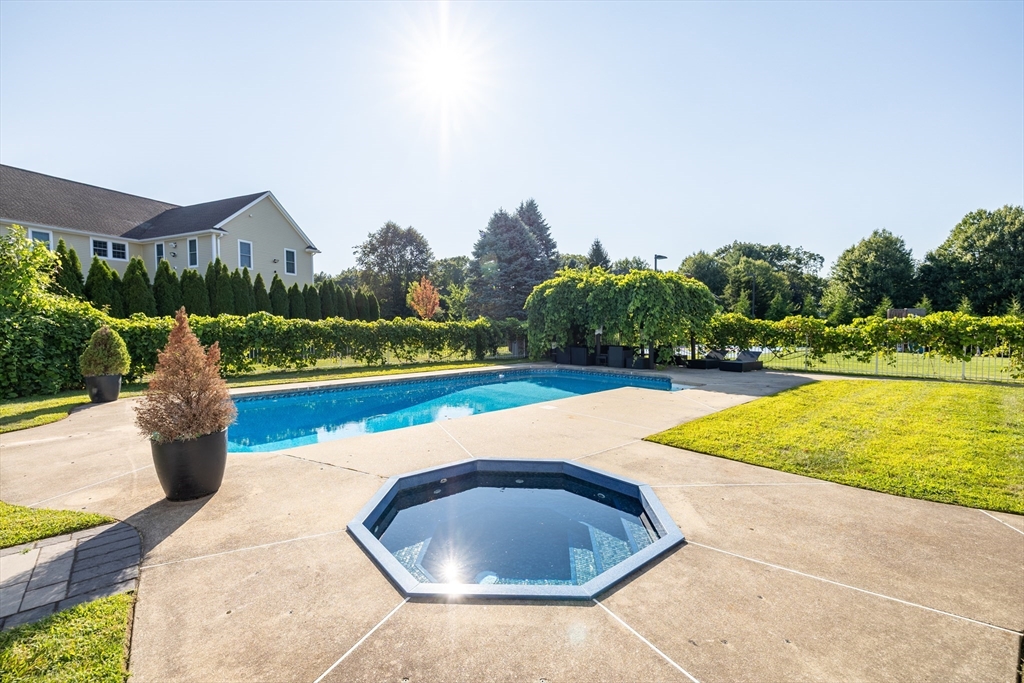2 Nollet Drive Andover, MA 01810 - Photo 5 of 9 a view of swimming pool with outdoor seating and yard in back