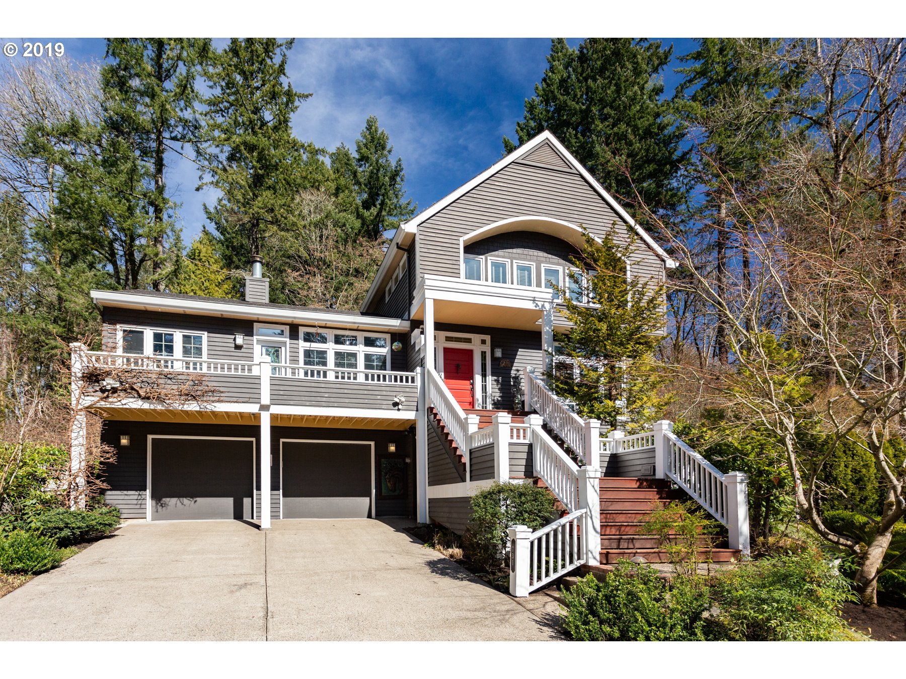 a view of house with a outdoor space and shower
