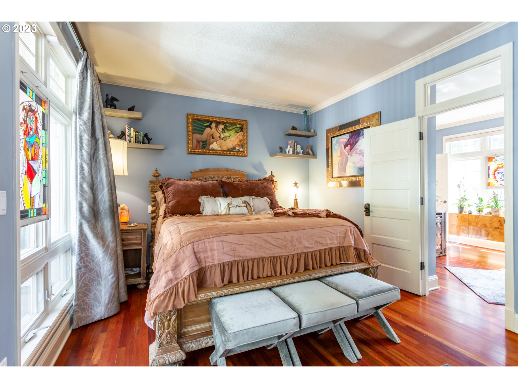 731 Southwest Bancroft Terrace Portland, OR 97239 - Photo 15 of 46 a bedroom with a bed and a view of kitchen