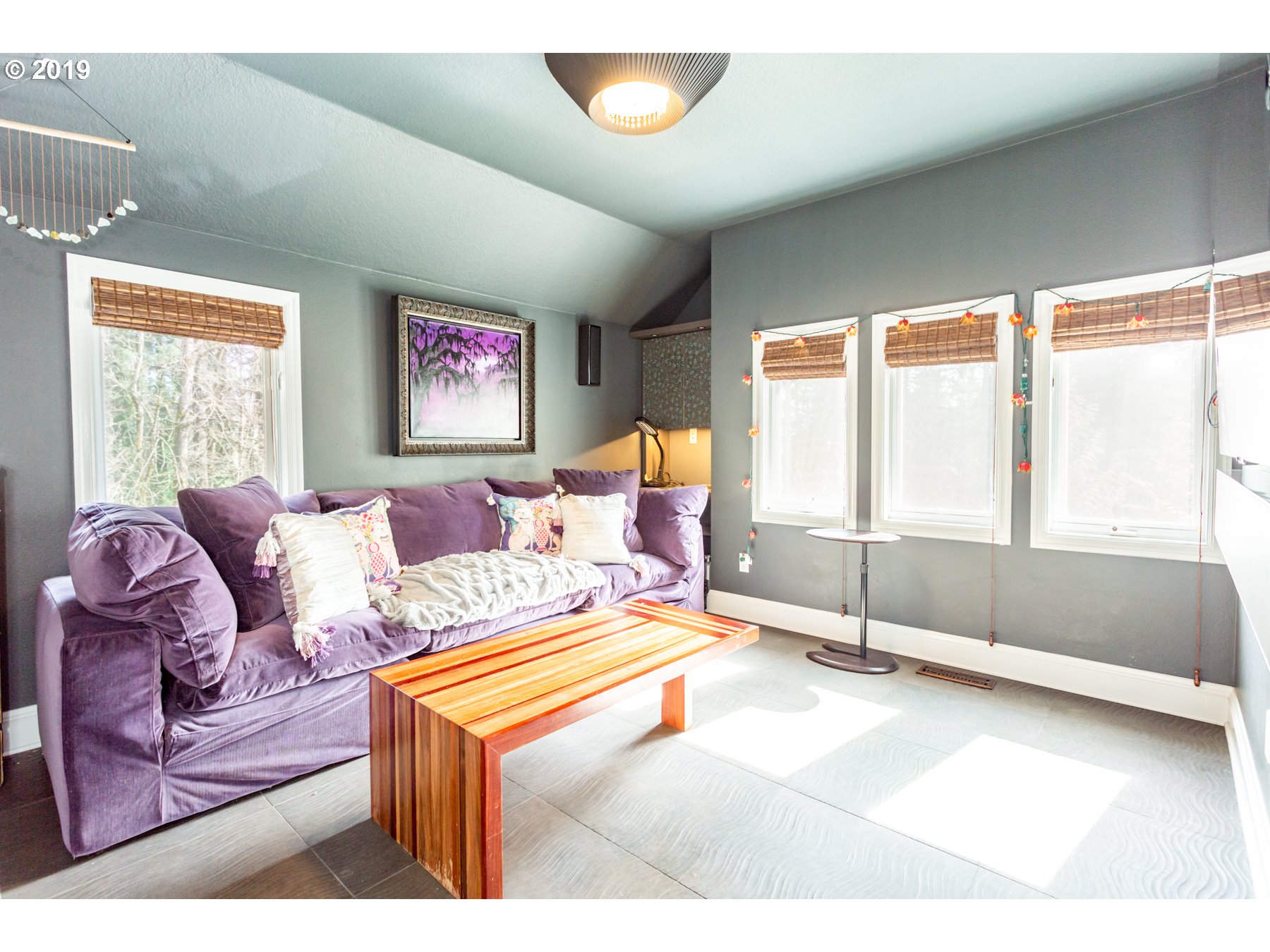 731 Southwest Bancroft Terrace Portland, OR 97239 - Photo 24 of 46 a living room with furniture and a large window