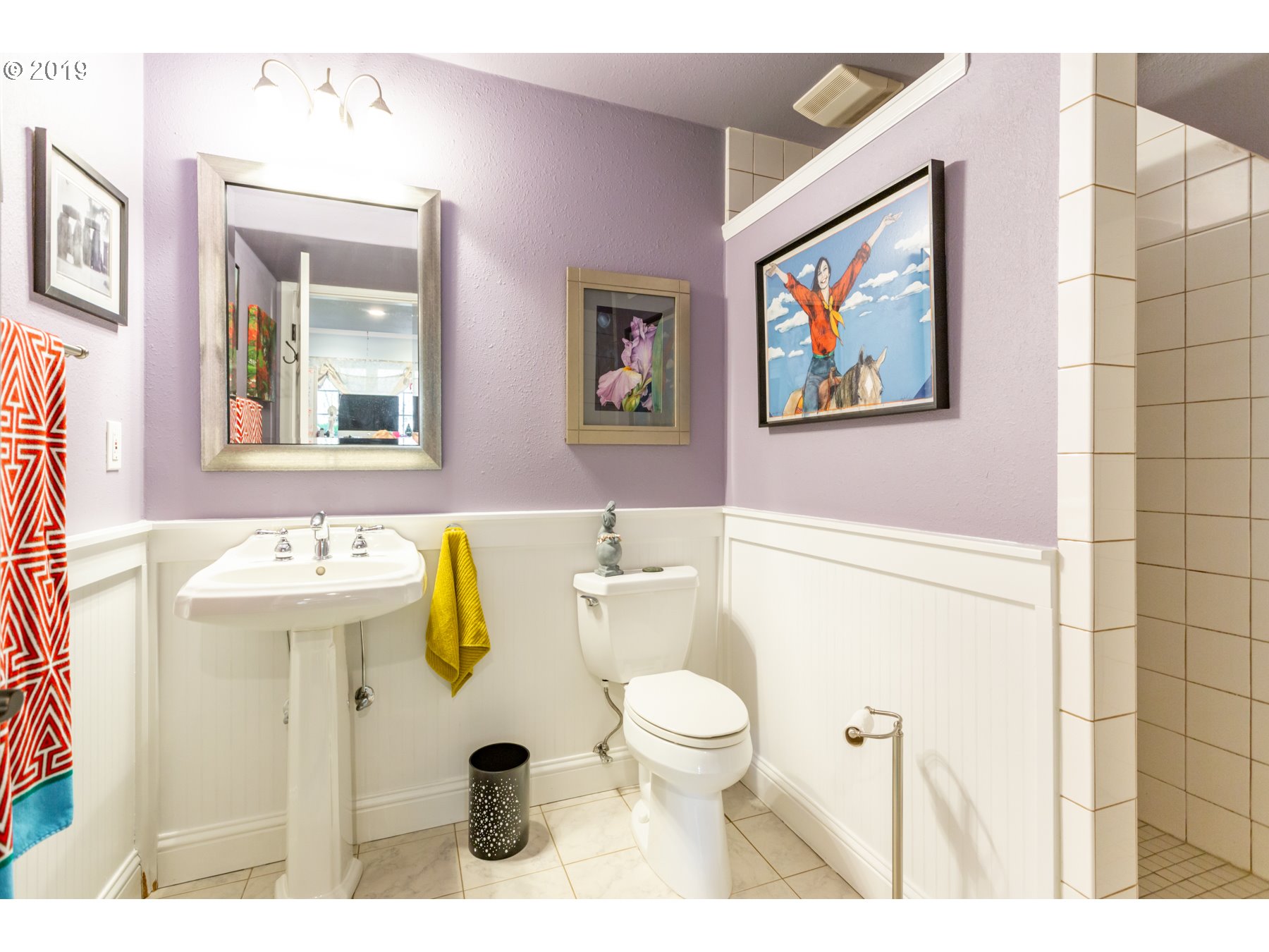 731 Southwest Bancroft Terrace Portland, OR 97239 - Photo 27 of 46 a bathroom with a sink mirror vanity and toilet