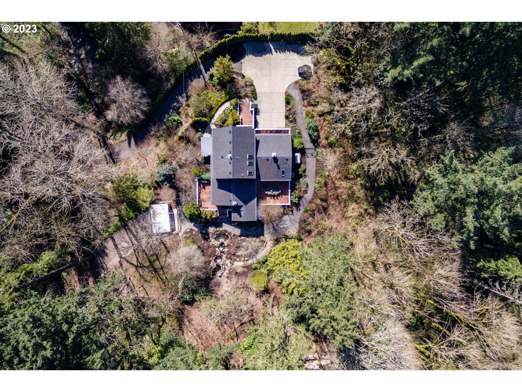 731 Southwest Bancroft Terrace Portland, OR 97239 - Photo 31 of 46 a view of house with outdoor space and seating area