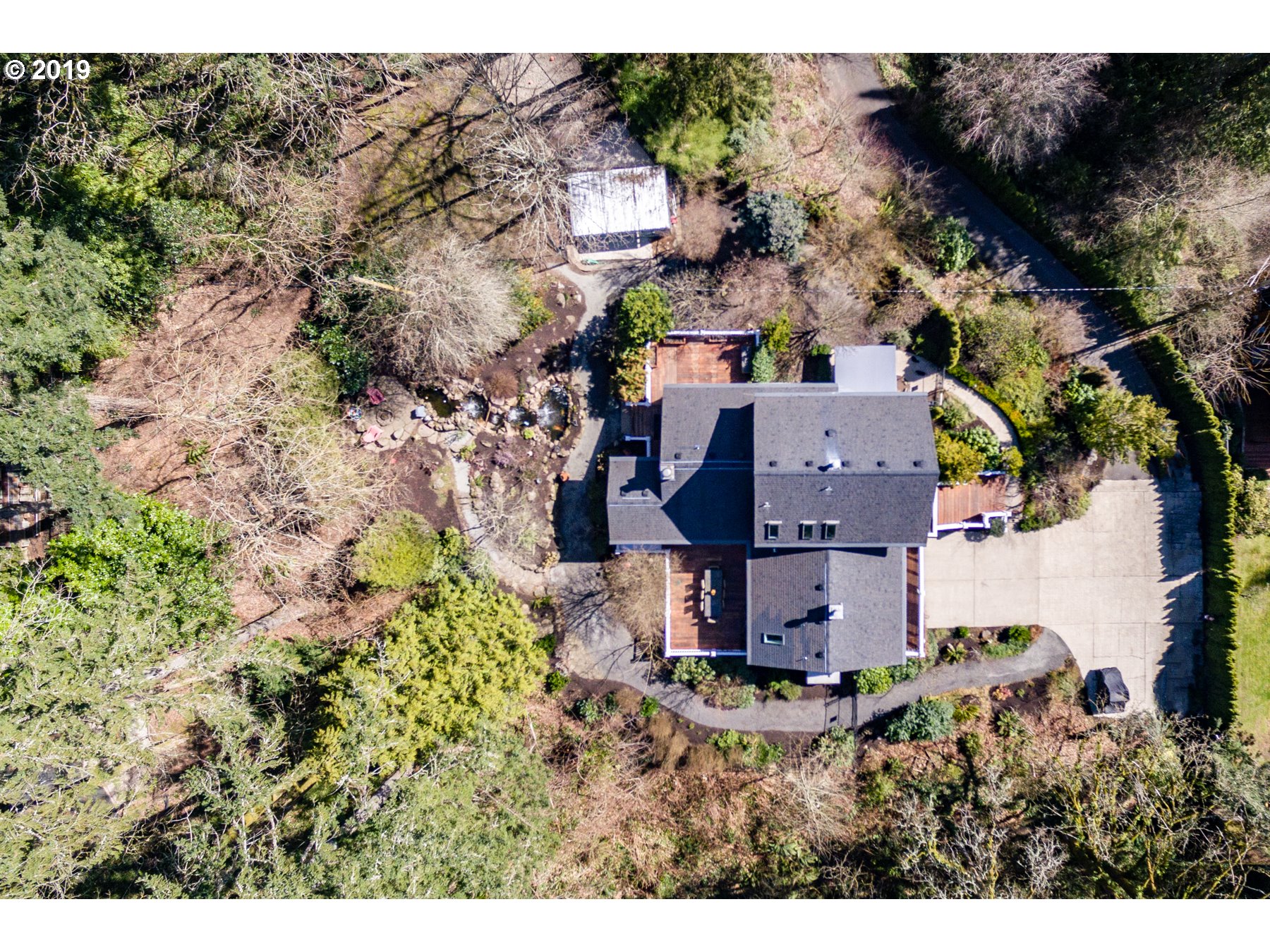 731 Southwest Bancroft Terrace Portland, OR 97239 - Photo 4 of 46 a view of a house with a yard