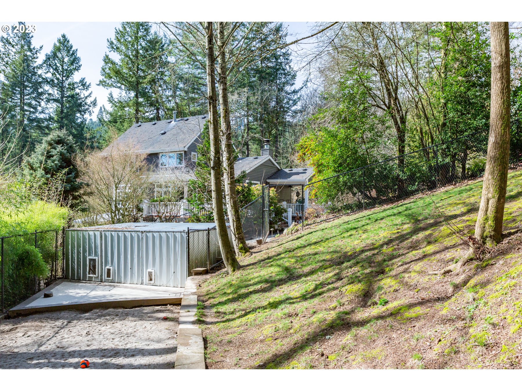 731 Southwest Bancroft Terrace Portland, OR 97239 - Photo 43 of 46 a view of a chair and table in the backyard