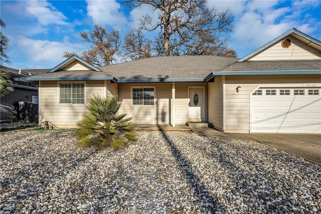 18230 Hidden Valley Road Hidden Valley Lake, CA 95467 - Photo 2 of 22 a front view of a house with garden