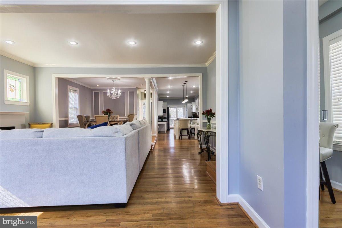 5306 Morello Road Baltimore, MD 21214 - Photo 2 of 37 a living room with furniture and a wooden floor