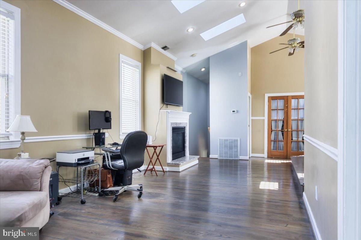5306 Morello Road Baltimore, MD 21214 - Photo 28 of 37 a view of a livingroom with lounge chair and a window