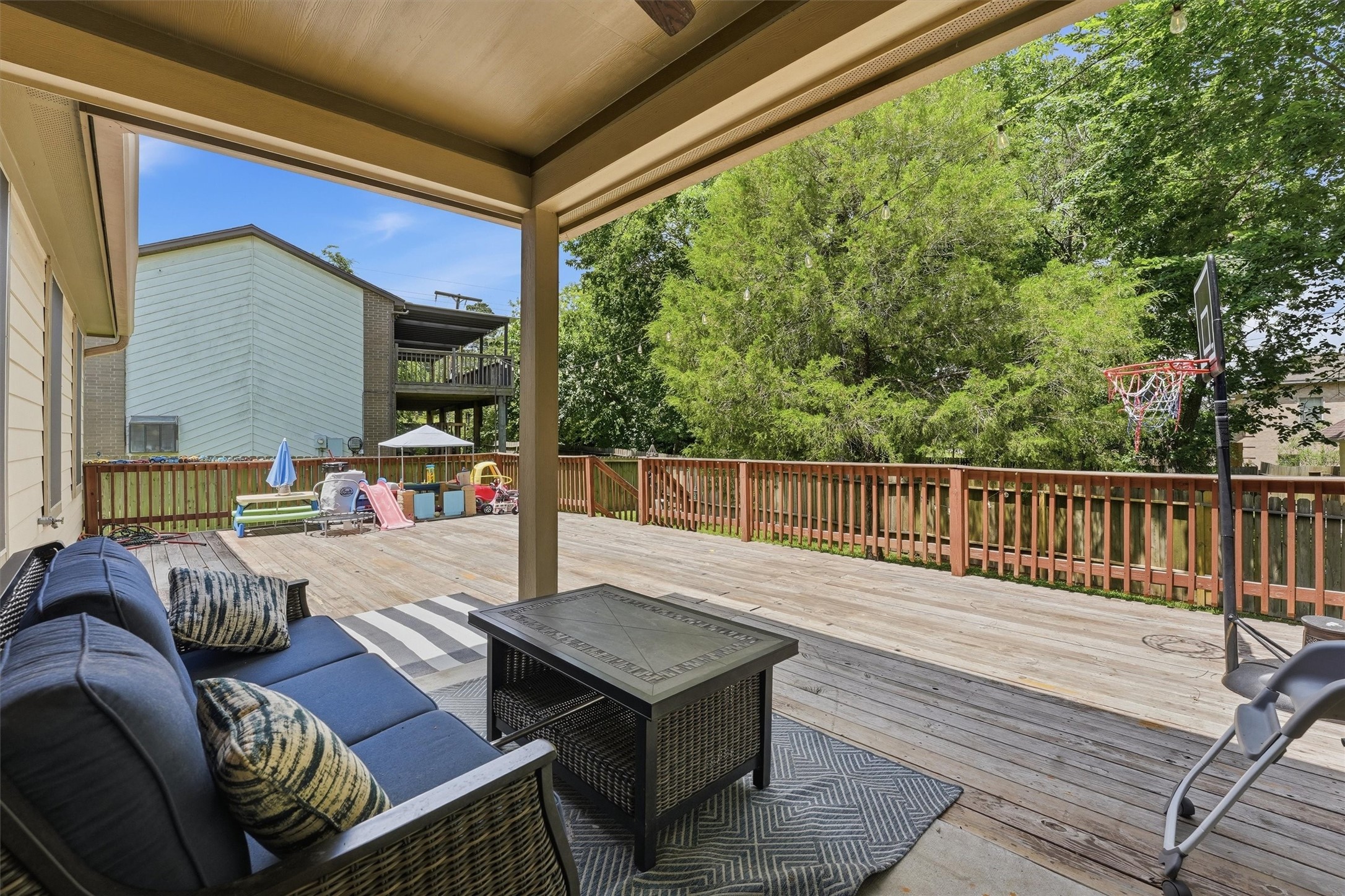 205 Kingspoint Conroe, TX 77356 - Photo 23 of 29 Fenced backyard with patio