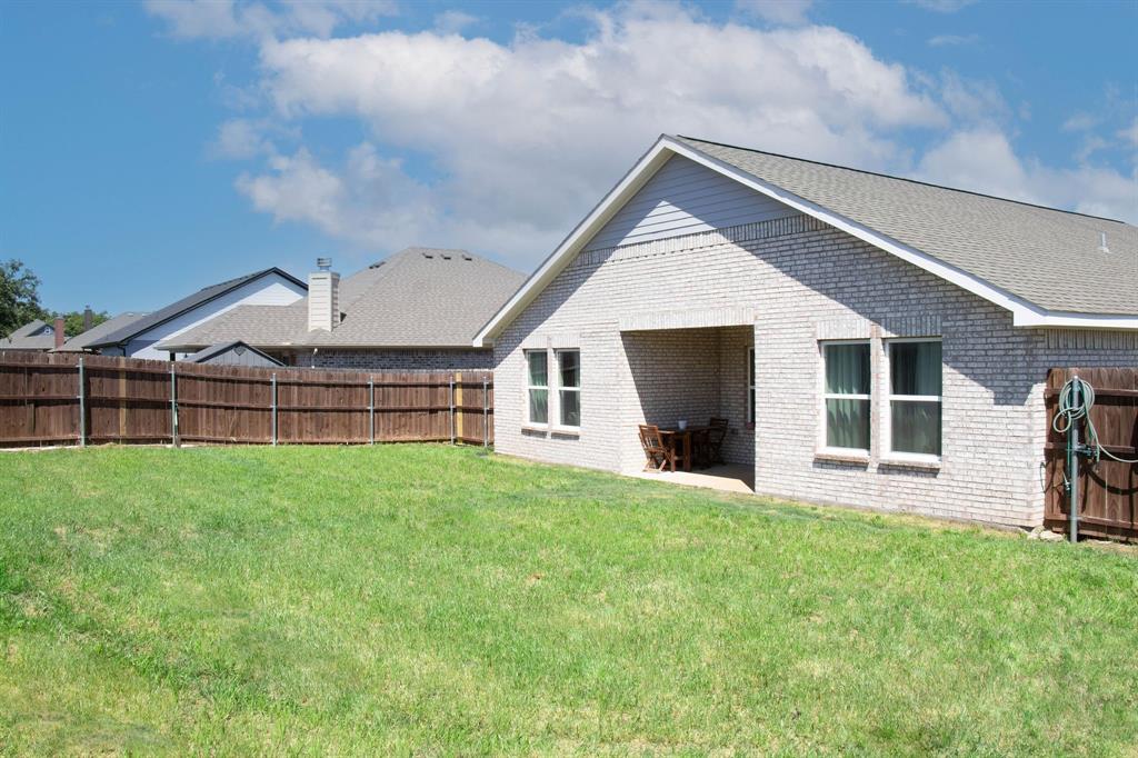 920 Avagail Avenue Springtown, TX 76082 - Photo 27 of 28 You can enjoy some nice gatherings in this backyard