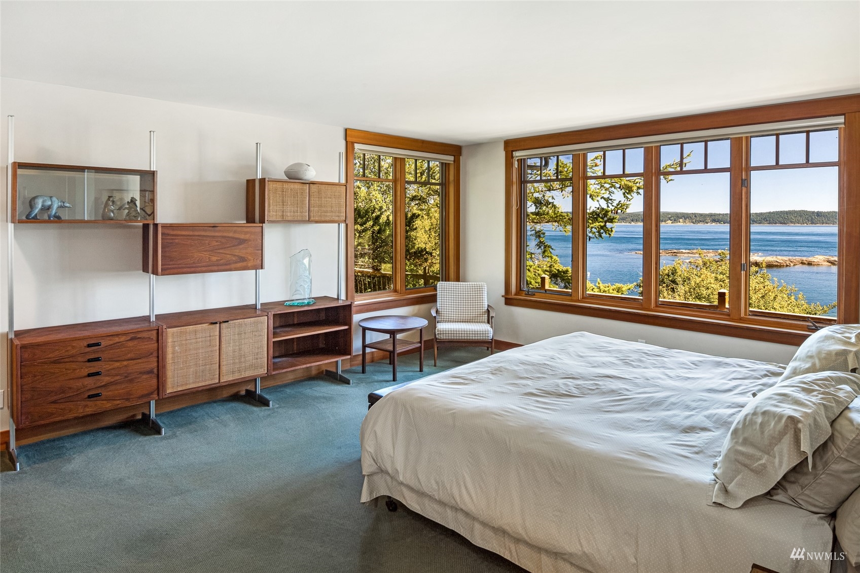 3209 Pear Point Road Friday Harbor, WA 98250 - Photo 17 of 40 a bedroom with a bed and a large window