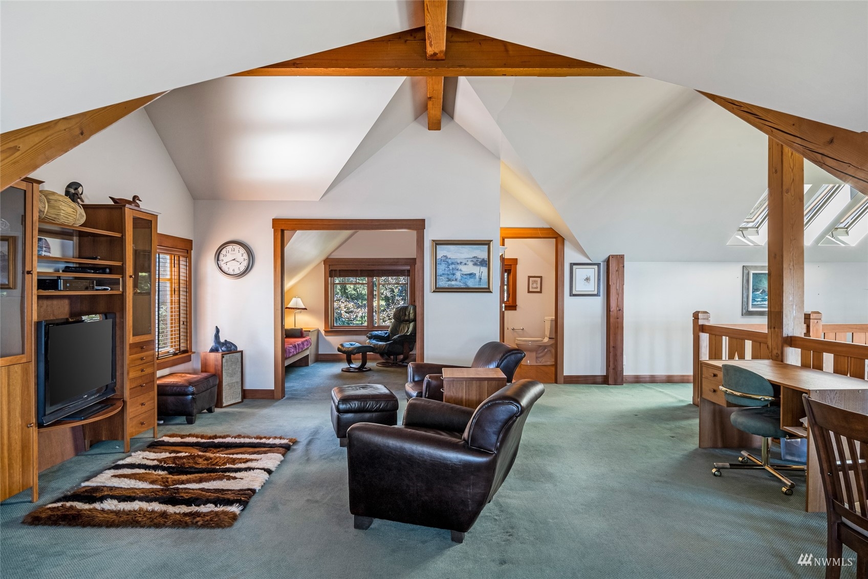 3209 Pear Point Road Friday Harbor, WA 98250 - Photo 24 of 40 a living room with furniture and a flat screen tv