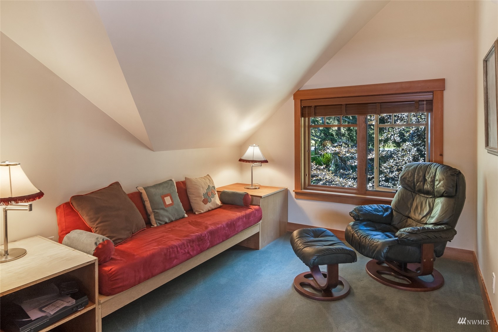 3209 Pear Point Road Friday Harbor, WA 98250 - Photo 26 of 40 a living room with furniture a floor to ceiling window and a table