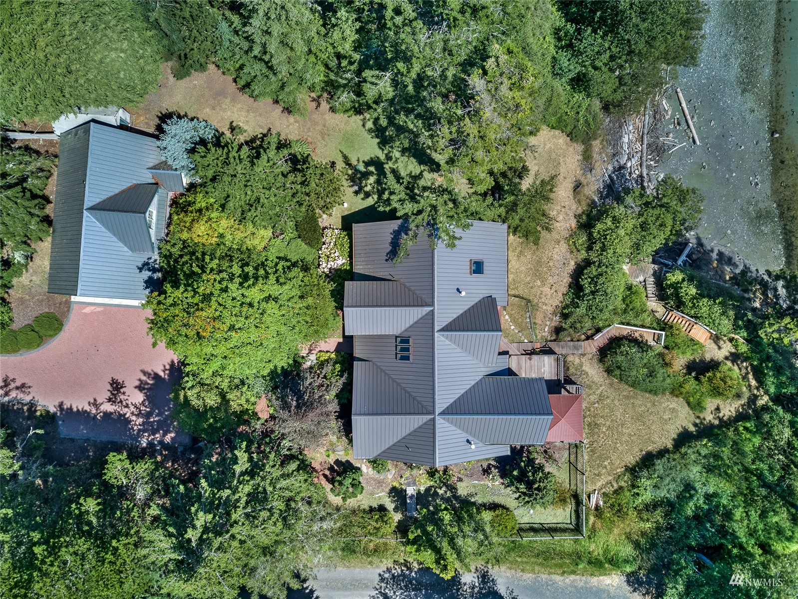 3209 Pear Point Road Friday Harbor, WA 98250 - Photo 40 of 40 an aerial view of a house with a yard and garden