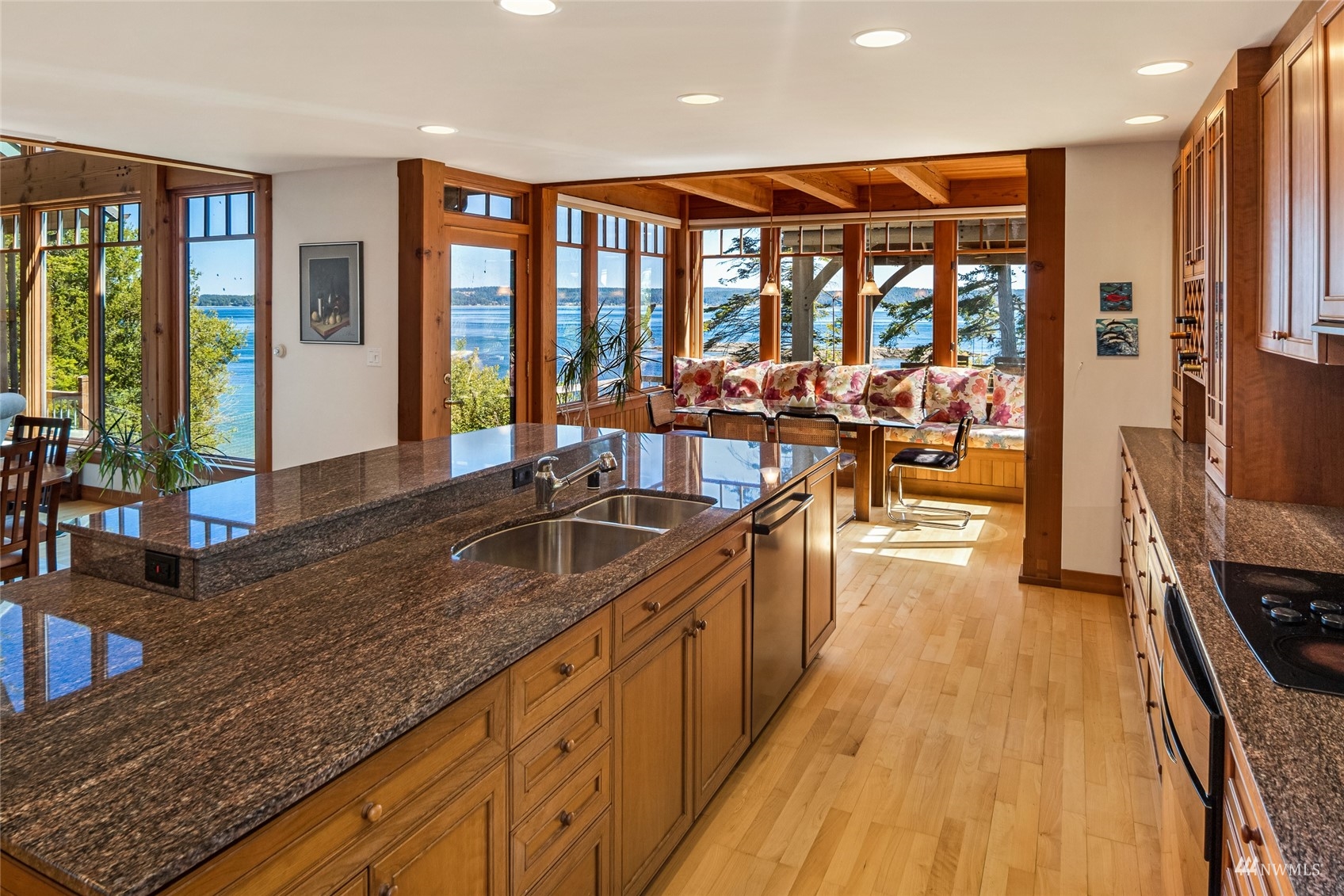 3209 Pear Point Road Friday Harbor, WA 98250 - Photo 9 of 40 a large kitchen with stainless steel appliances granite countertop a large window and a counter space