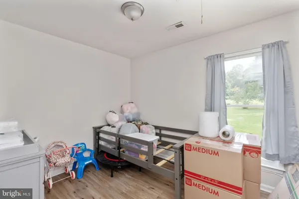 a room with furniture and a window