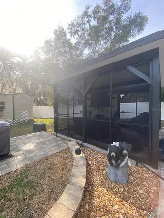 a terrace of a house with outdoor seating