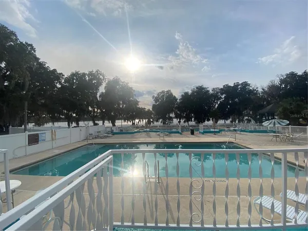 a terrace with outdoor seating and city view