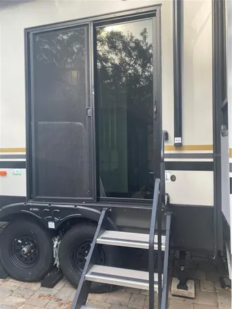 a water heater sitting next to a window