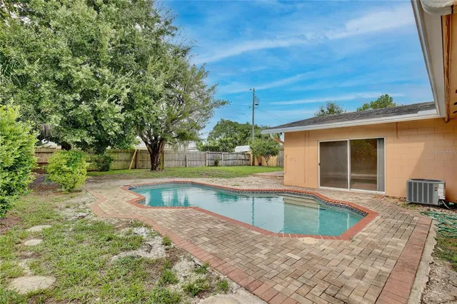 a view of a house with a swimming pool