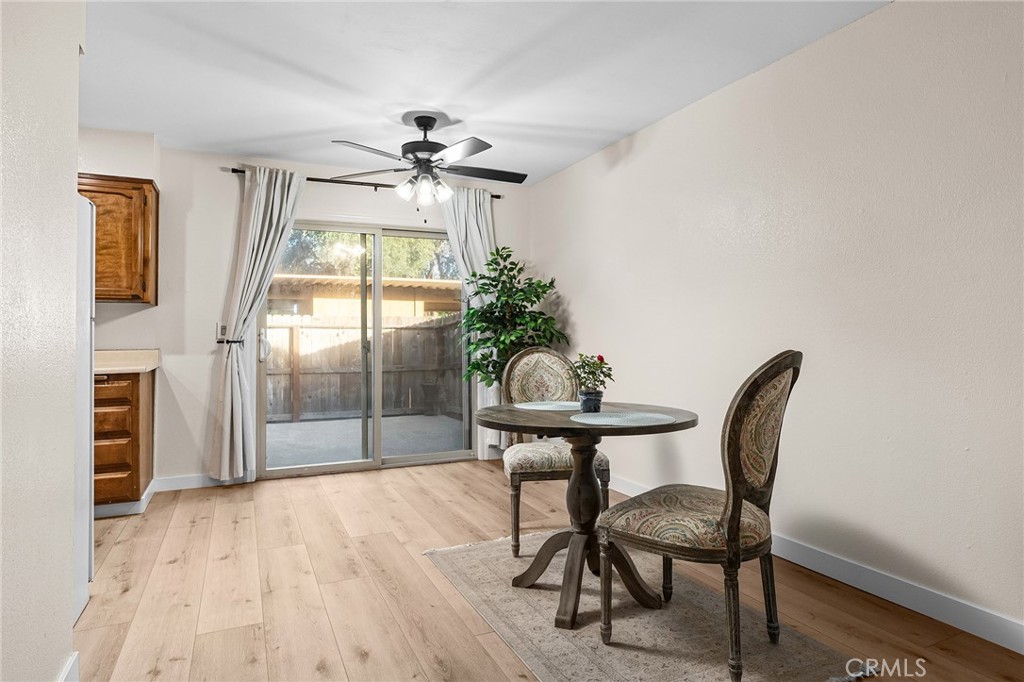 1261 Parque Drive Chico, CA 95926 - Photo 12 of 45 a view of a dining room with furniture and chandelier