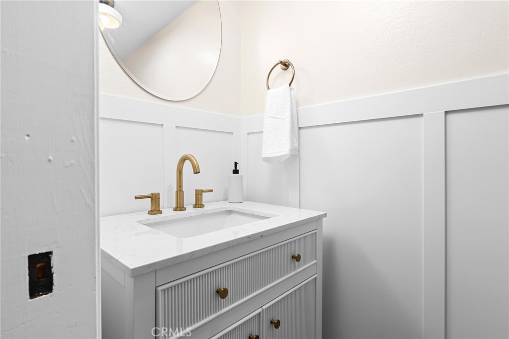 1261 Parque Drive Chico, CA 95926 - Photo 14 of 45 a bathroom with a sink and a mirror