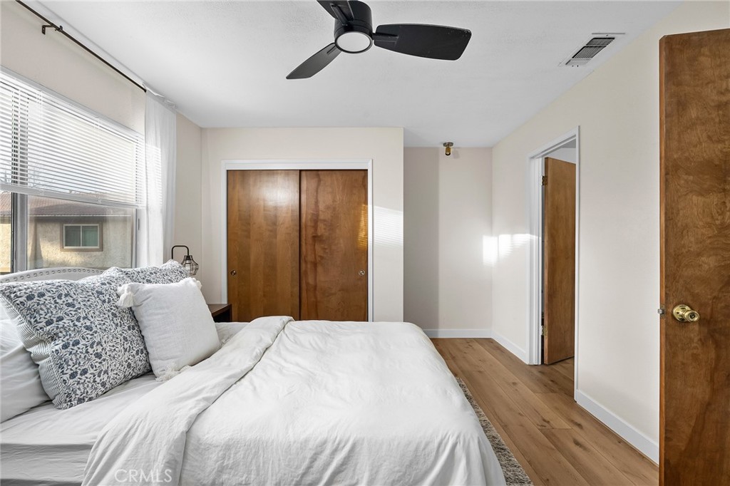 1261 Parque Drive Chico, CA 95926 - Photo 17 of 45 a bedroom with a bed and a large mirror