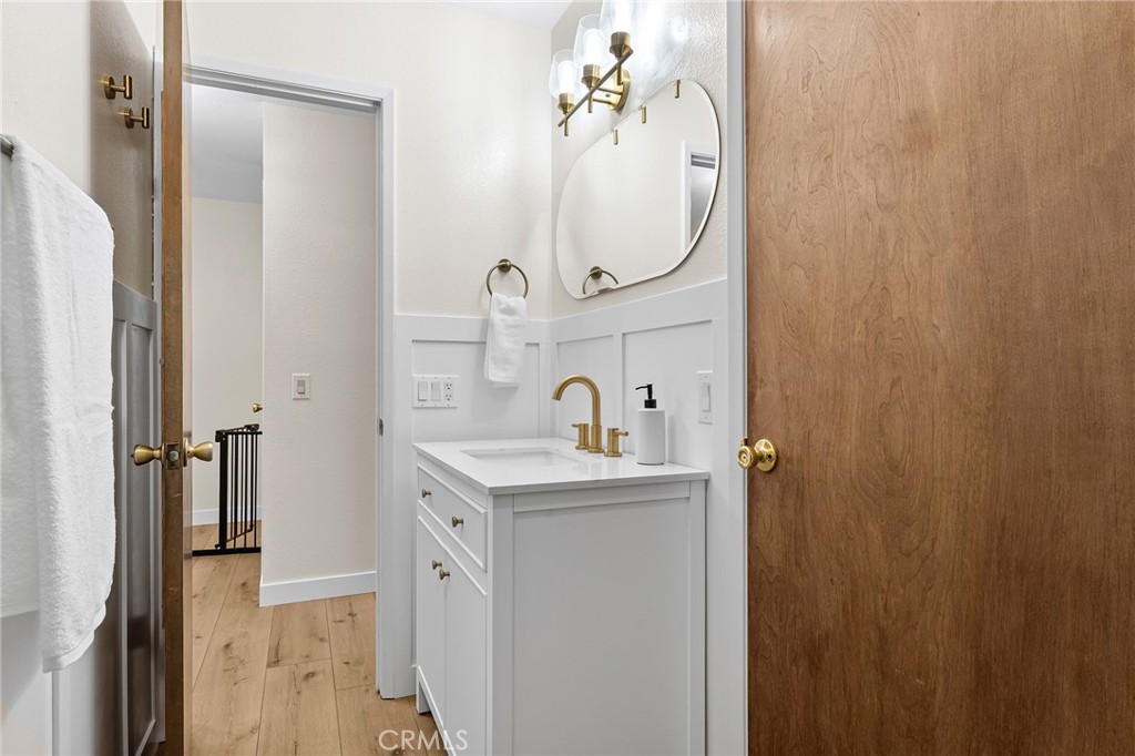1261 Parque Drive Chico, CA 95926 - Photo 21 of 45 a bathroom with a sink a mirror and a shower