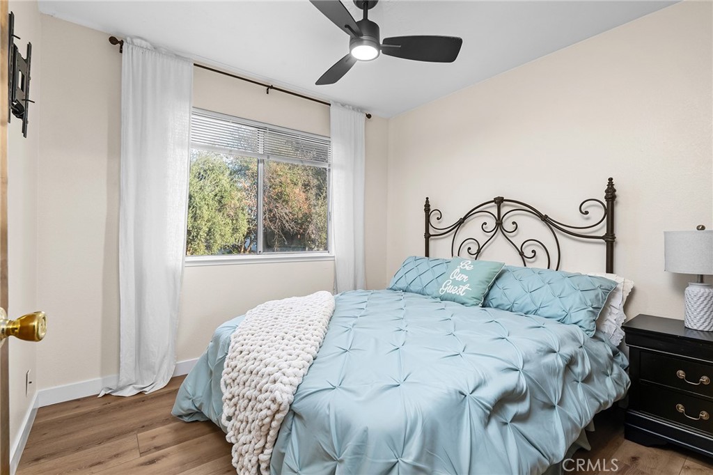 1261 Parque Drive Chico, CA 95926 - Photo 22 of 45 a bedroom with a bed and a window