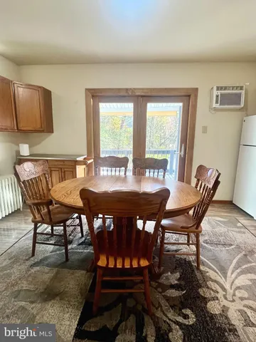 a view of a bedroom with washer and dryer
