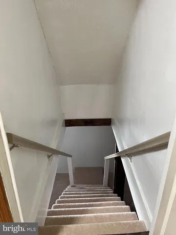 a view of a livingroom with wooden floor