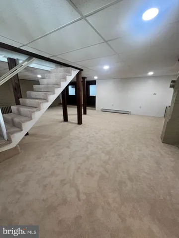 a view of a balcony with wooden floor