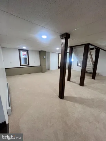 a view of balcony with wooden floor