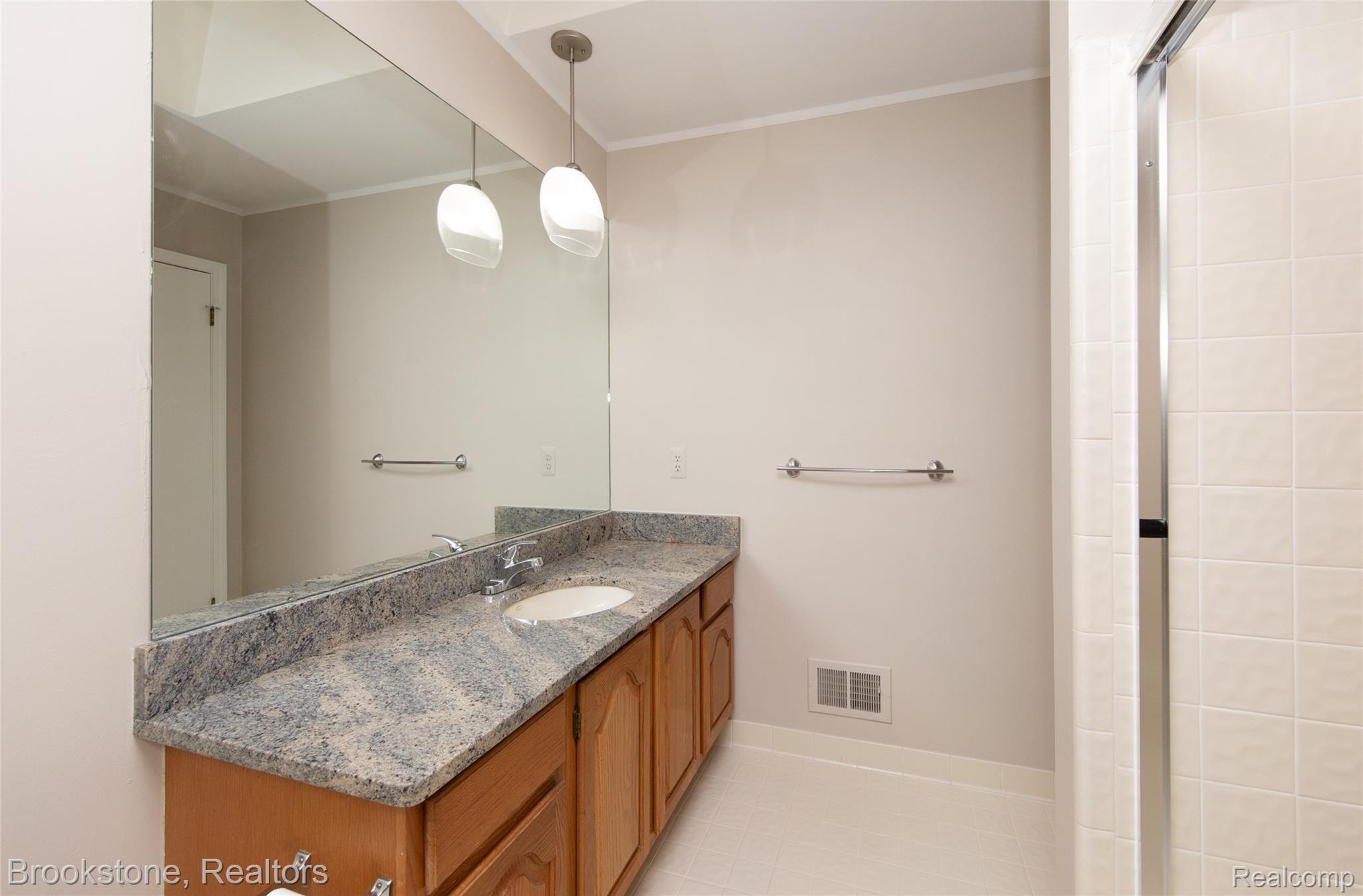 937 Ten Point Drive Rochester, MI 48309 - Photo 33 of 40 Gorgeous Family Bath has huge vanity