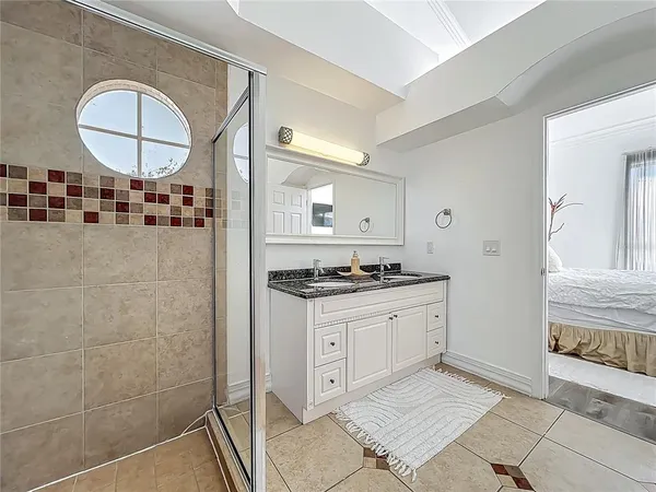 a view of a kitchen counter space and wooden floor