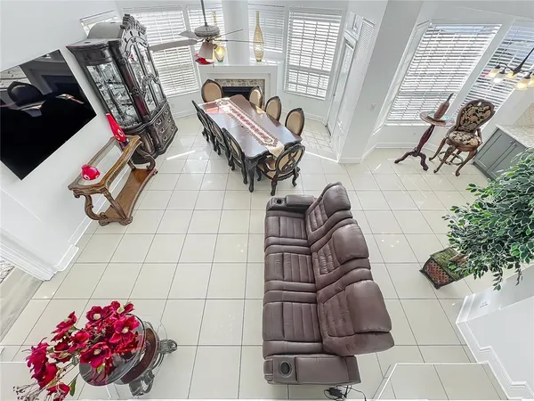a bathroom with granite countertop a sink and a mirror