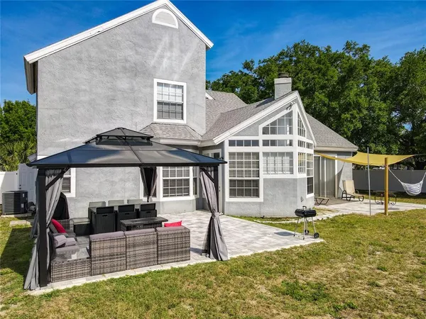a view of a house with a yard