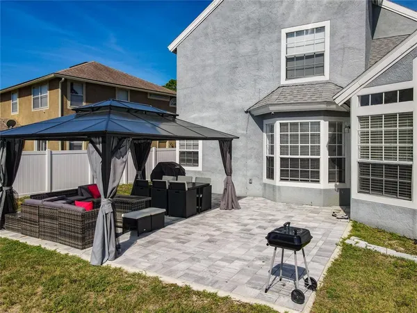 a front view of a house with parking area