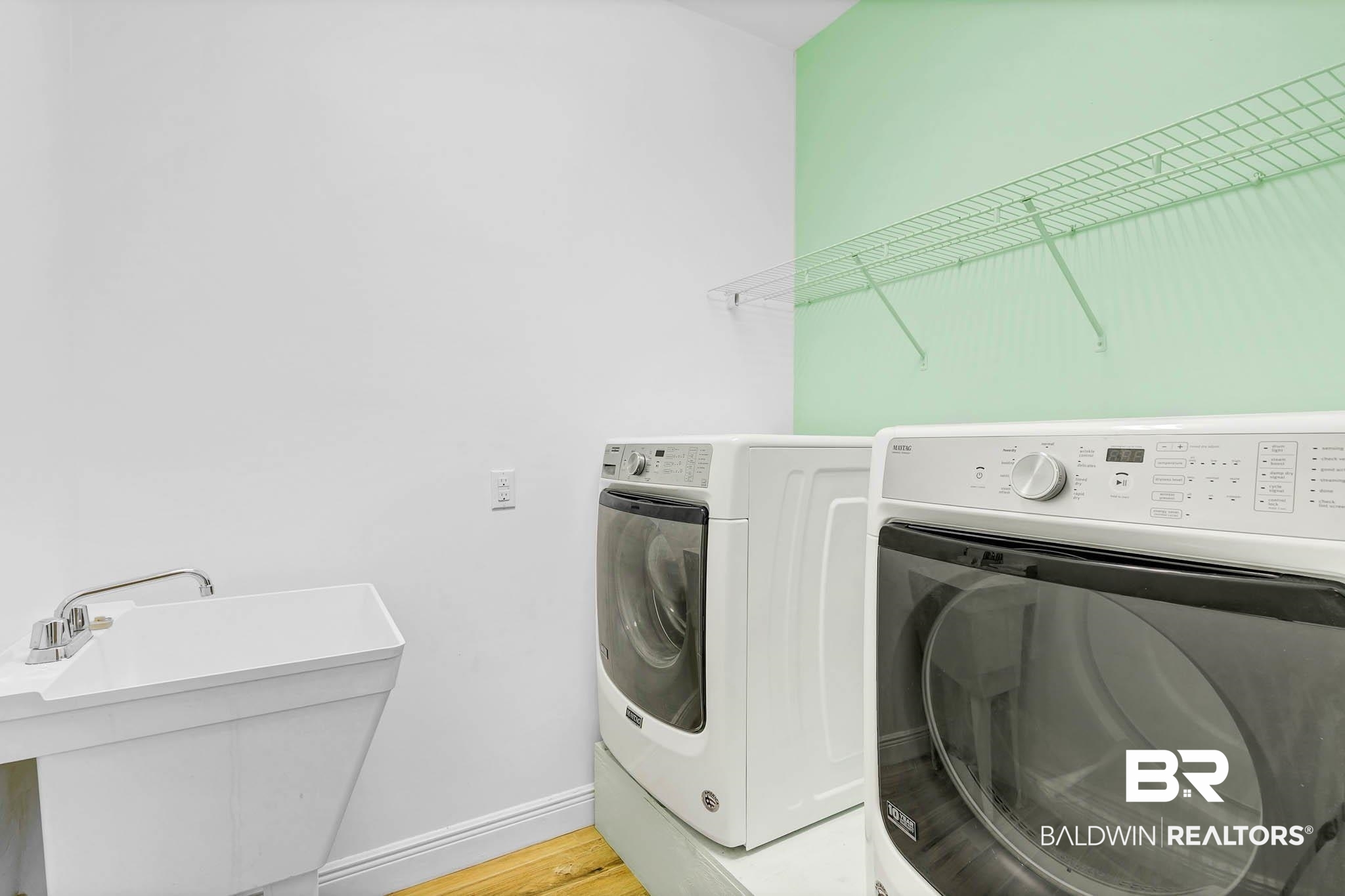8145 Bay View Drive Foley, AL 36535 - Photo 43 of 81 Laundry area featuring separate washer and dryer and light wood-style floors