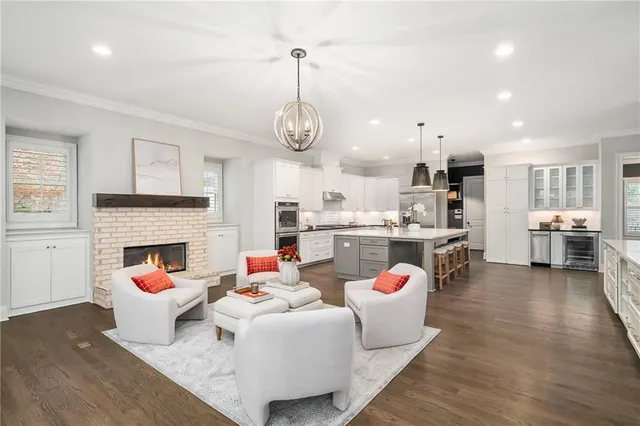 a bedroom with a bed and a ceiling fan