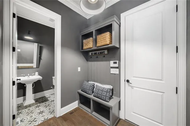 an empty room with a ceiling fan and window