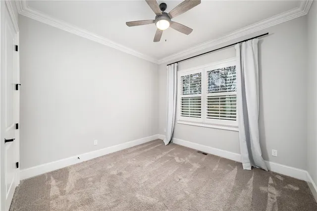 a bathroom with a bathtub sink vanity mirror and toilet